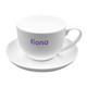 A white tea cup with a matching saucer, featuring a logo in purple on the cup.