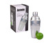 A stainless steel cocktail shaker with a clear lid, accompanied by a green lime, placed beside its packaging.
