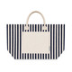 A striped tote bag featuring navy blue and cream colours with two handles and a front pocket. It has a logo.