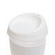A reusable coffee cup featuring a clear body and a white silicone lid.