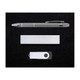 A silver pen, USB drive, and a sleek metallic note holder arranged on a black background. A silver pen, USB drive, and a sleek metallic note holder arranged on a black background.