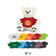A plush white bear wearing a red shirt, surrounded by various coloured shirts in different shades. It has a logo on the shirt.