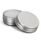 Two silver lip balm tins, one open to reveal the white balm inside. Both tins have a metallic finish.