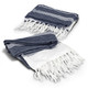 A navy and white throw blanket with a herringbone pattern and fringed edges. It is neatly folded. A navy and white throw blanket with a herringbone pattern and fringed edges. It is neatly folded.