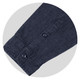 A navy denim button-up shirt featuring a buttoned cuff and a subtle texture, complete with a logo.