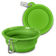 A green silicone collapsible pet bowl with a carabiner clip, displaying its expanded and folded forms.