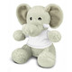 A grey elephant plush toy with large ears, wearing a white shirt, sitting on a flat surface.