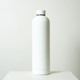 A drink bottle in sleek white, with a cylindrical design and a cap, featuring a subtle logo.