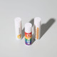 Three tubes of lip balm in white and multicoloured packaging, featuring logos.