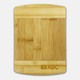 A bamboo cutting board featuring a smooth surface with a rectangular shape and a small logo on one side.