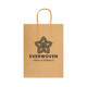 A large brown paper bag with a logo and a patterned design featuring a flower-like shape.