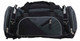 A duffle bag in dark grey and black, featuring multiple compartments and zippers, along with sturdy handles.