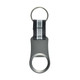 A drink bottle opener in matte grey with a black and white striped strap and a keyring attachment.
