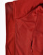 A red softshell vest featuring a smooth exterior and a textured interior, with a zippered pocket and a logo.