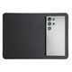 A wireless charger and mouse pad combination featuring a sleek black design, with a smartphone positioned on top.