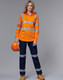 An orange high-visibility work shirt with reflective stripes, paired with navy trousers, featuring a logo.