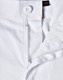 A close-up view of white unisex utility stretch cargo work pants showcasing the waistband and button detail.