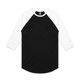 A black and white raglan tee with three-quarter sleeves and a label at the neckline.