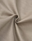 A close-up of beige cotton stretch ripstop fabric, displaying a textured weave and a smooth finish.