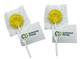 Yellow lollipops wrapped in clear plastic with a white stick and attached tags featuring branding.