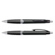 A pair of green plastic pens with black grips and silver accents, featuring a logo on the barrel.