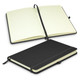 A black notebook with a textured cover, featuring lined pages and an elastic closure, opened to reveal its interior.