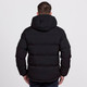 A black puffer jacket with a hood, featuring a quilted design and a visible logo on the back.