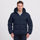 A navy puffer jacket with a hood and zip-up front, featuring side pockets. The model is wearing it with a grey top.