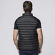 A black padded vest with a high collar, featuring horizontal stitching and a logo on the back.