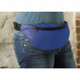 A blue hipster budget fanny pack worn around the waist, featuring a zippered pocket and a black adjustable strap.