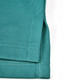 A close-up of a teal men's sustainable poly/cotton polo shirt, featuring a detailed hem and stitching.