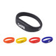 An oval silicone wristband flash drive in black, with orange, yellow, and blue wristband options, featuring logos.