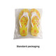 A pair of yellow EVA platform thongs with a playful pattern, packaged in clear plastic. A pair of yellow EVA platform thongs with a playful pattern, packaged in clear plastic.