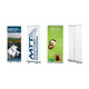 Four pull-up banners in varying designs, featuring a mix of blue, green, and neutral tones, with logos and images.