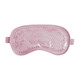 A pink gel cold/hot eye mask with a textured surface and elastic straps for a secure fit.