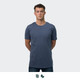 A plain navy blue men's t-shirt with a round neckline, worn by a model standing upright. Features a logo.