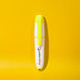 A highlighter in white and bright yellow, featuring a branding logo on its body, set against a yellow background.