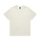 A plain white T-shirt with a round neckline and short sleeves, featuring a small logo on the label.