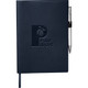 A navy refillable journal with a logo and an elastic pen holder featuring a silver pen.