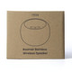 A brown cardboard box featuring a simple illustration of a round bamboo wireless speaker with a logo.