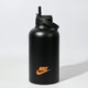 A black drink bottle with a flip-top lid and a logo. It has a matte finish and holds 1.8 litres.