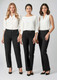Three models wearing black slacks, styled with white blouses. The pants feature a sleek design and fit.