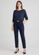 Navy mid-rise pull-on pants paired with a matching top, featuring a sleek fit and a subtle logo.