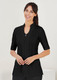 A black women's tunic with a zippered front and short sleeves, featuring a sleek design and a fitted silhouette.