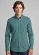 A men's long sleeve button-up shirt in a teal colour, featuring a collar and a logo on the chest.