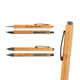 A collection of bamboo pens in various designs, featuring a clip and grey accents. One pen has a logo.