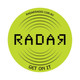 A round green mouse mat featuring a logo with dots and sound wave patterns.