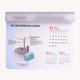 A mouse mat featuring a calendar layout, predominantly in white with a blue accent, and a logo in the design.