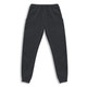 Unisex sweatpants in dark grey with an elastic waistband and pockets. Features a simple logo on the front.