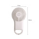 A white mini fan with a keyring attachment and LED light features a circular fan design and a handle.